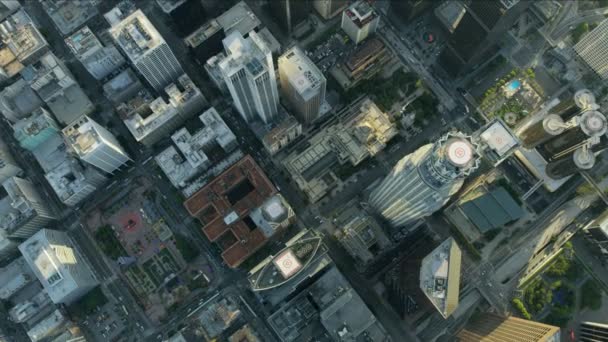 Aerial overhead view skyscraper rooftop heliports downtown LA — Stockvideo