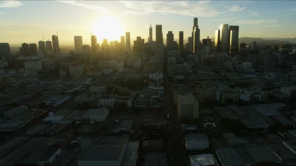 Aerial sunset view Skid Row with LA skyscrapers — Stock Video