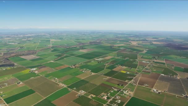 Aerial of scenic patchwork crops fields Central Valley — Stockvideo