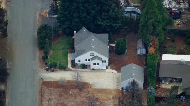 Aerial view home which survived destruction Paradise California — Stock Video