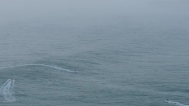 Aerial surfer riding huge wave Mavericks California America — Stock Video