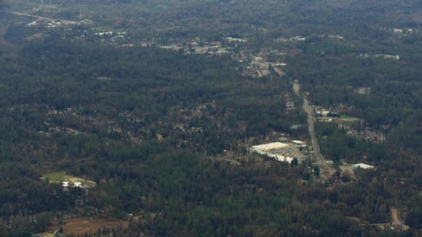 Aerial view community devastated by forest wildfire Campfire — Stock Video