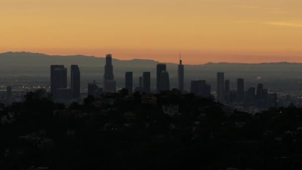 Aerial sunrise view LA skyline from Mount Hollywood — Stock Video