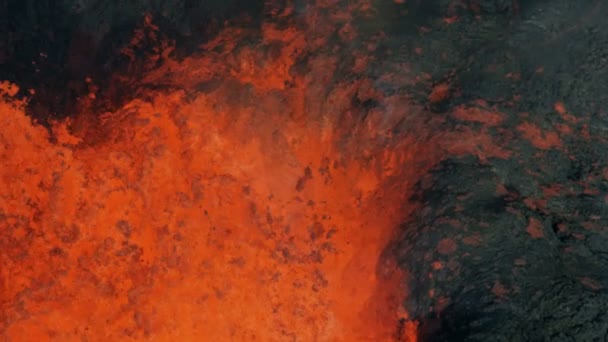 Aerial explosive molten lava spewing from erupting volcano — Stock Video