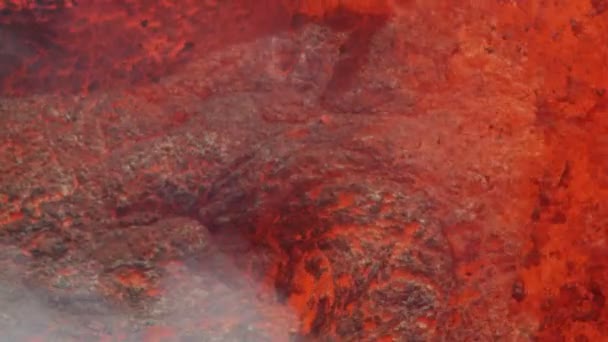 Aerial view hot lava rock forming on landing — Stock Video