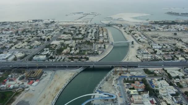 Aerial view Dubai Creek canal Tolerance Bridge skyscrapers — Vídeos de Stock