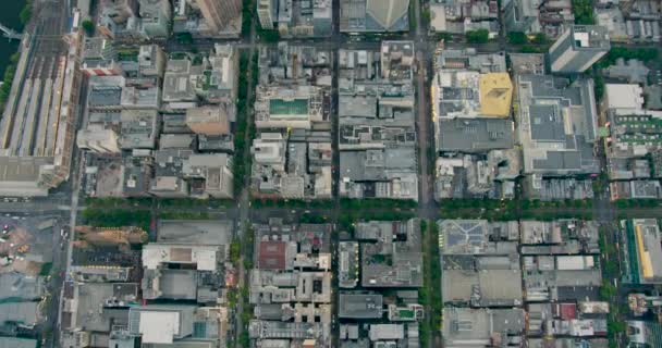 Vista aérea do telhado Melbourne edifícios da cidade ao pôr-do-sol — Vídeo de Stock