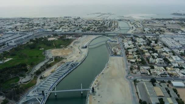 Aerial view Dubai Creek canal Tolerance Bridge skyscrapers — Stock Video