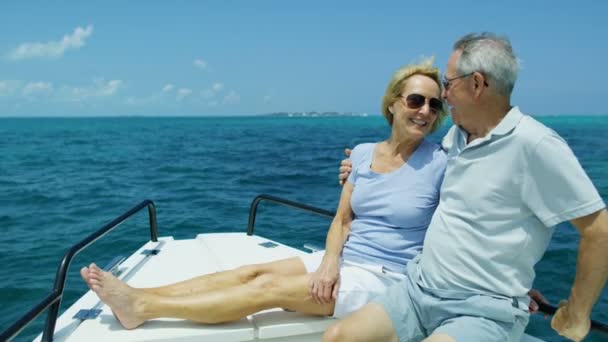 Happy Caucasian couple sailing luxury yacht carefree together — Stock Video