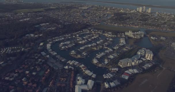 Aerial dusk view waterway canal luxury homes Queensland — Stock Video