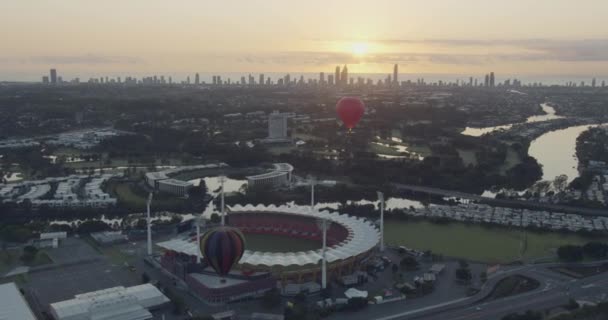 Aerial sunrise hot air Balloons city skyscrapers Australia — Stock Video