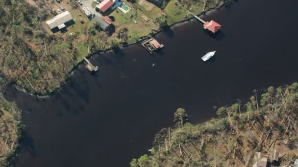 Overhead aerial view hurricane damaged community residential property — Stock Video