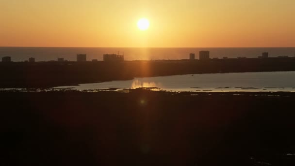 Aerial sunset West Bay peninsula Panama City America — ストック動画