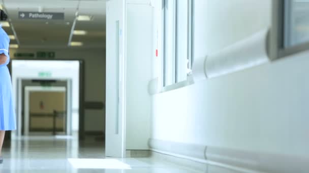 Older Patient Ethnic Nurse Hospital Corridor — Stock Video