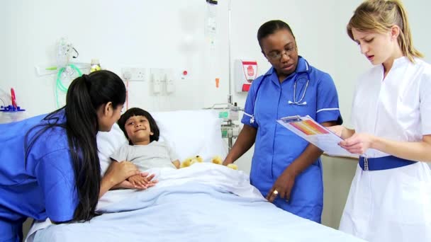 Specialist Nursing Staff Treating Child Patient — Stock Video