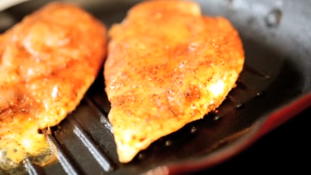 Chicken breast cooking in hot pan — Stock Video