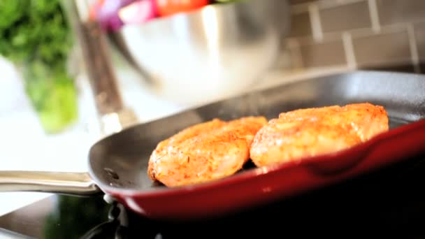 Chicken breast cooking in hot pan — Stock Video