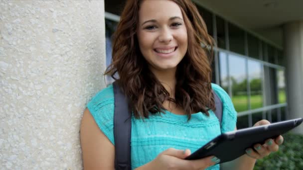 Female student with wireless tablet — Stock Video