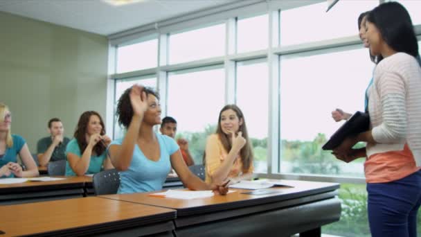 Female college student giving presentation — Stock Video