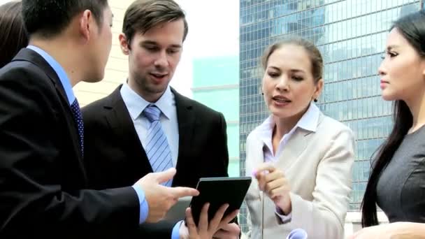 Business colleagues meeting outside office building — Stock Video