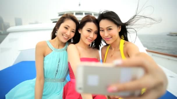 Girls taking selfie on yacht — Stock Video