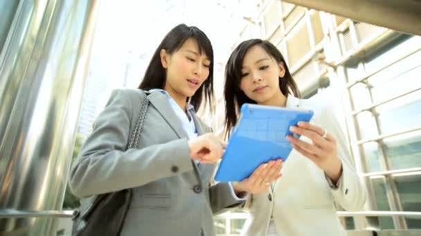 Businesswomen watching good news — Stock Video