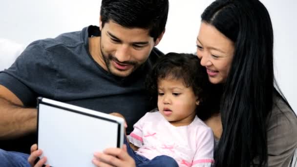 Parents with daughter using tablet — Stock Video