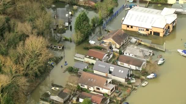 Local people wades through floodwaters — Stock Video