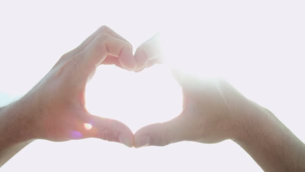 Male hands making heart shape — Stock Video