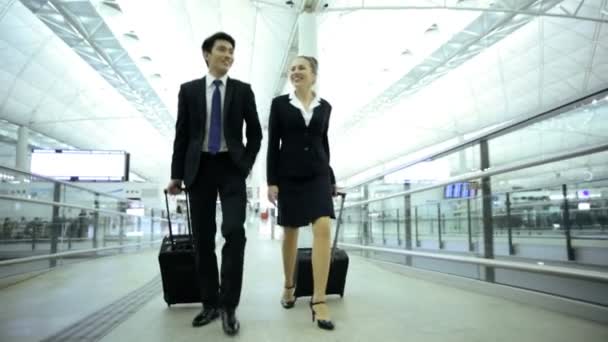 Financial consultants in airport terminal — Stock Video