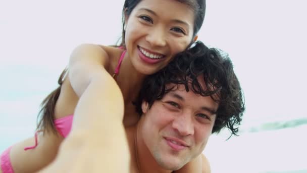 Couple having fun on beach — Stock Video