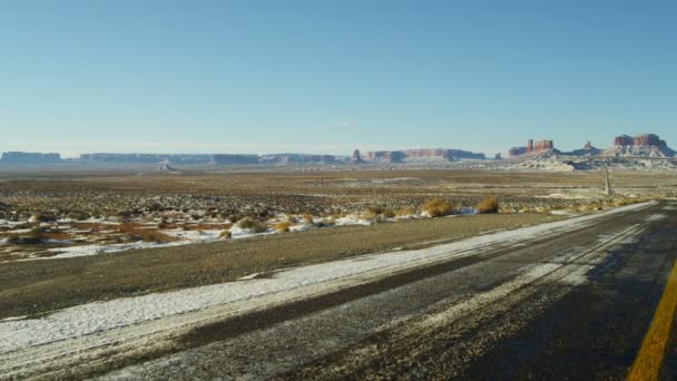 Monument Valley ons Route 163 Utah sneeuw Colorado Plateau — Stockvideo