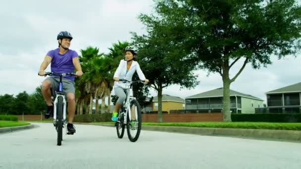 Couple enjoying together cycling outdoors — Stock Video