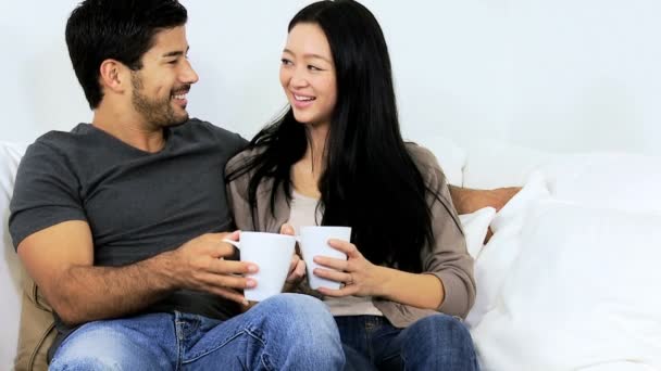 Couple drinking coffee at home — Stock Video