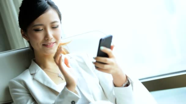 Businesswoman in hotel taking selfie — Stock Video