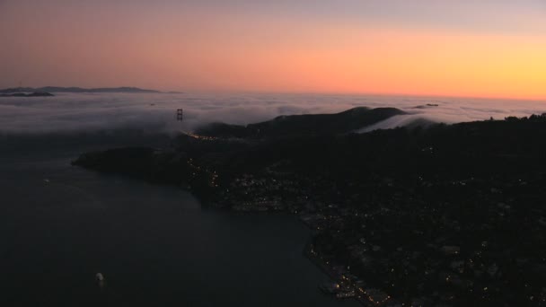 Aerial sea fog sunset San Francisco Bay Golden Gate USA — Stock Video