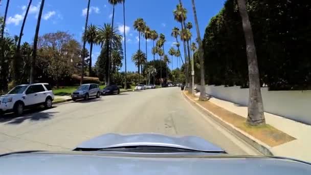 Drive residential vehicle commuter traffic Beverly Hills — Stock Video