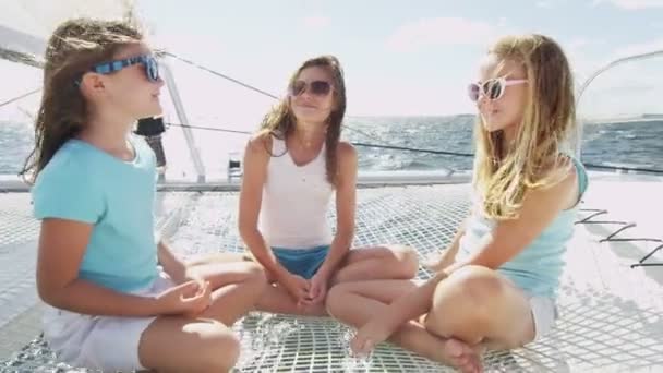 Young sisters having fun on luxury yacht — Stok video