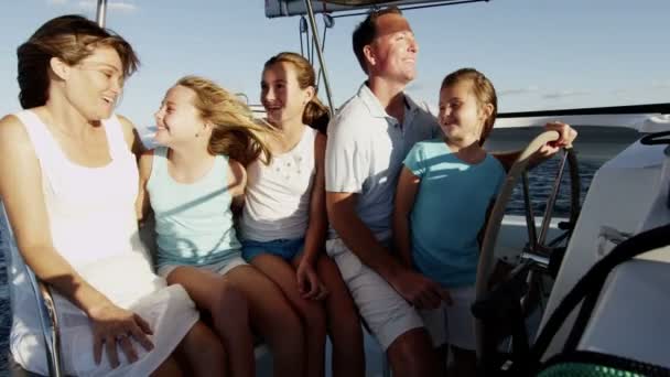 Family with children sailing on luxury yacht — Stock Video