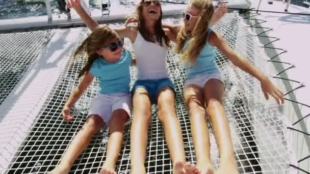 Young sisters having fun on luxury yacht — Stock videók