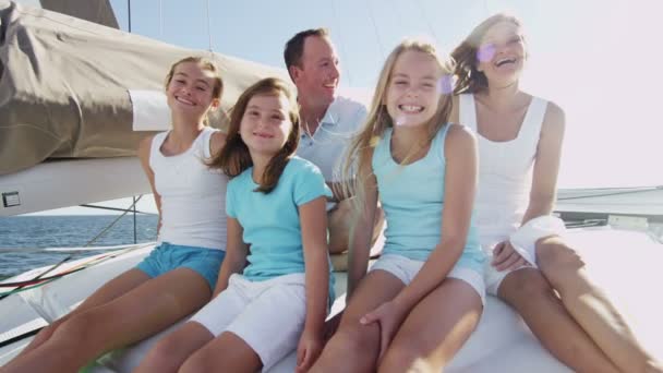 Young girls with parents  having fun on luxury yacht — ストック動画