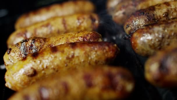 Sausages grilling chargrilled barbecue — Stock Video