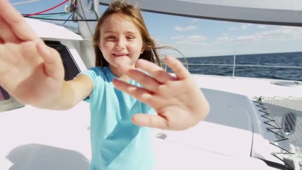 Young girl on luxury yacht in the ocean — Stock Video