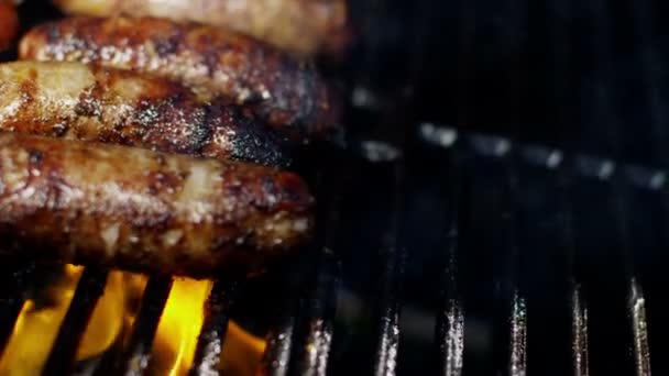 Sausages grilling chargrilled barbecue — Stock Video