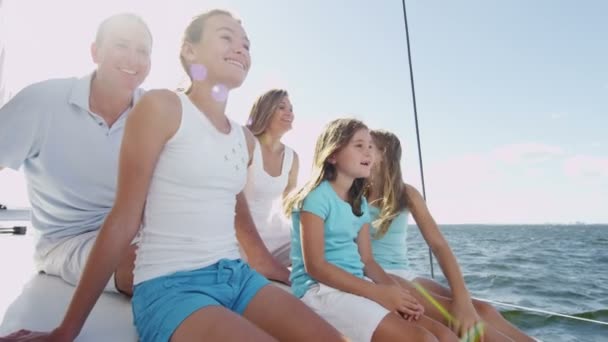 Young girls with parents  having fun on luxury yacht — Stock video