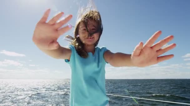 Young girl on luxury yacht in the ocean — Stock Video