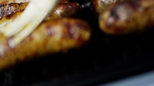 Sausages grilling chargrilled barbecue — Stock Video