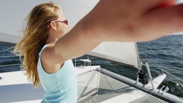 Young girl on luxury yacht in the ocean — Stock Video