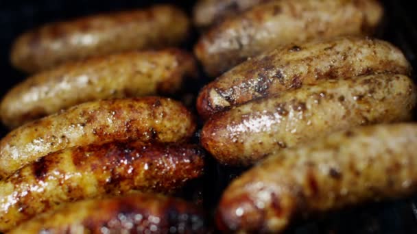 Grilled meat sausages on BBQ — Stock Video