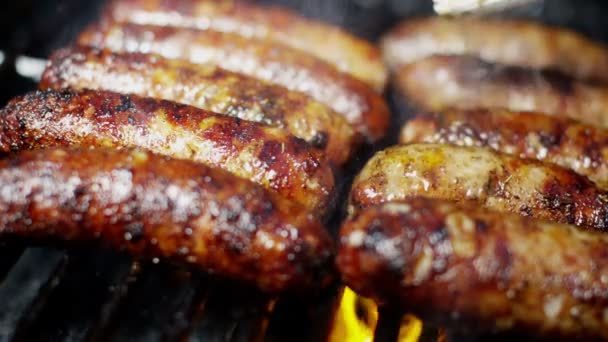 Sausages grilling chargrilled barbecue — Stock Video